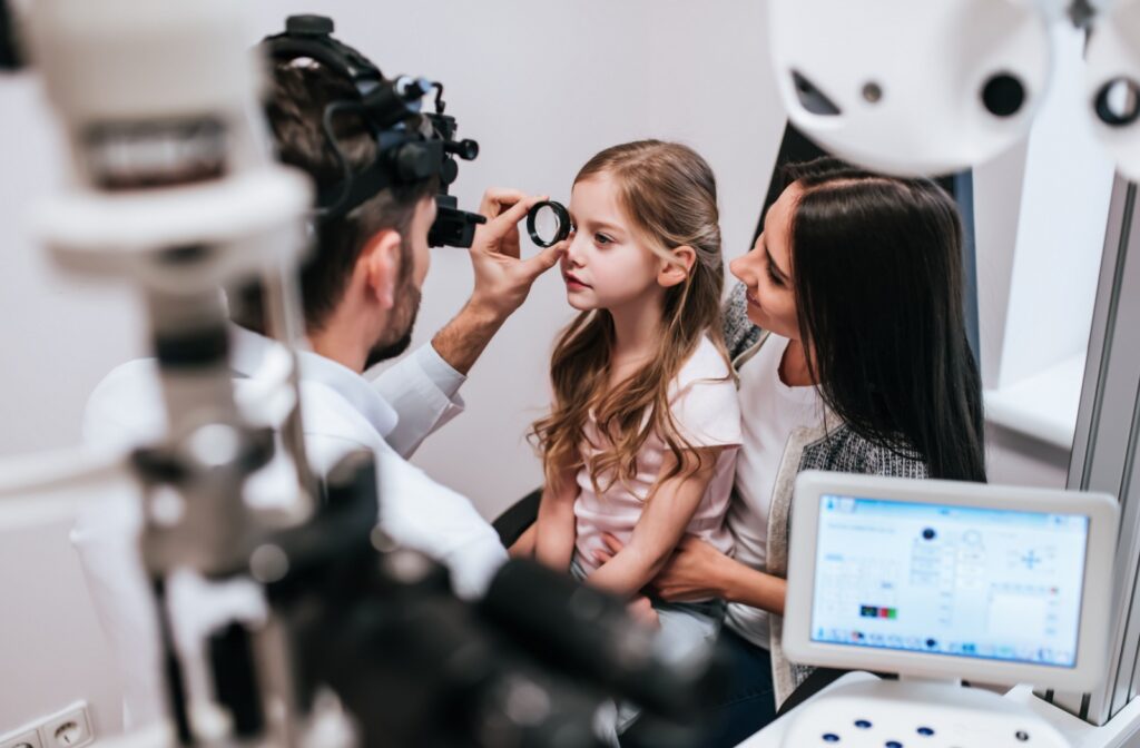 Child receiving a comprehensive eye exam to monitor and manage myopia progression.