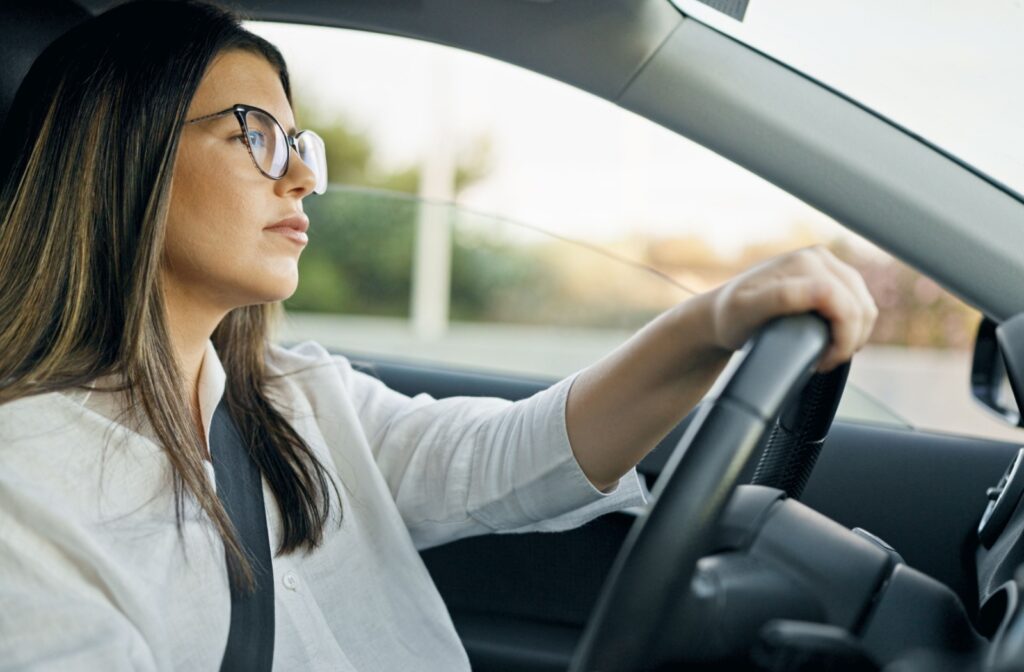 Person driving during the day with glasses on after an eye exam