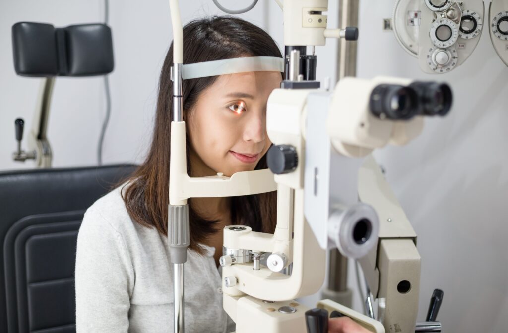 A person getting an eye test done during a routine eye exam